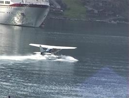 A sea plane takes off from Geirangerfjord while we wait to depart on our cruise